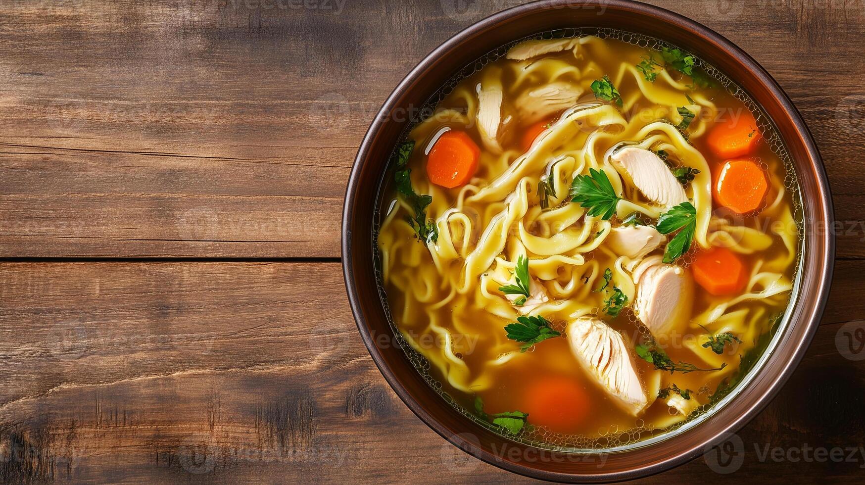 Chicken noodle soup in a dish with visible chicken, noodles, and vegetables, photorealistic food photo