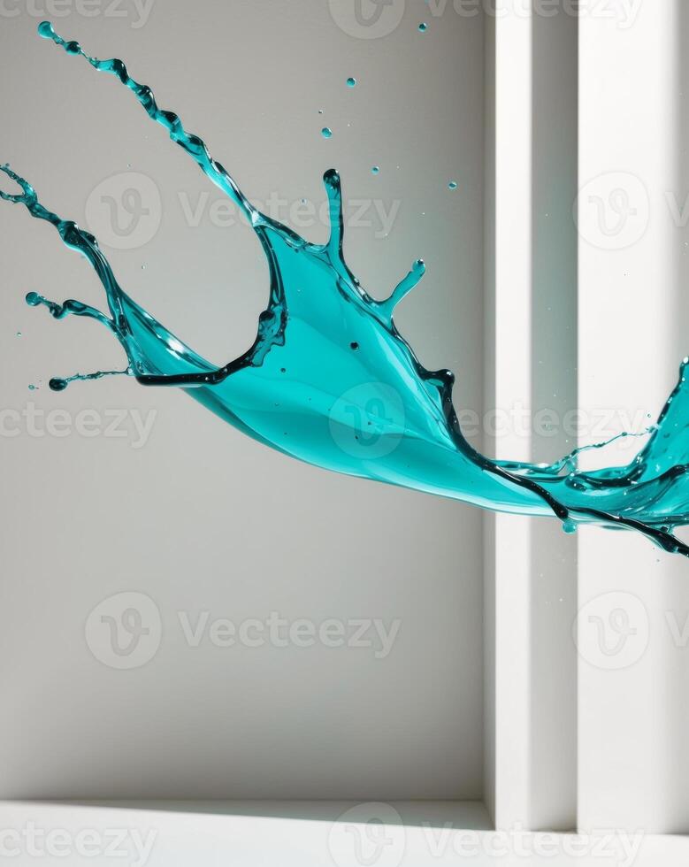 vibrant turquoise splash of liquid creates dynamic visual impact. photo