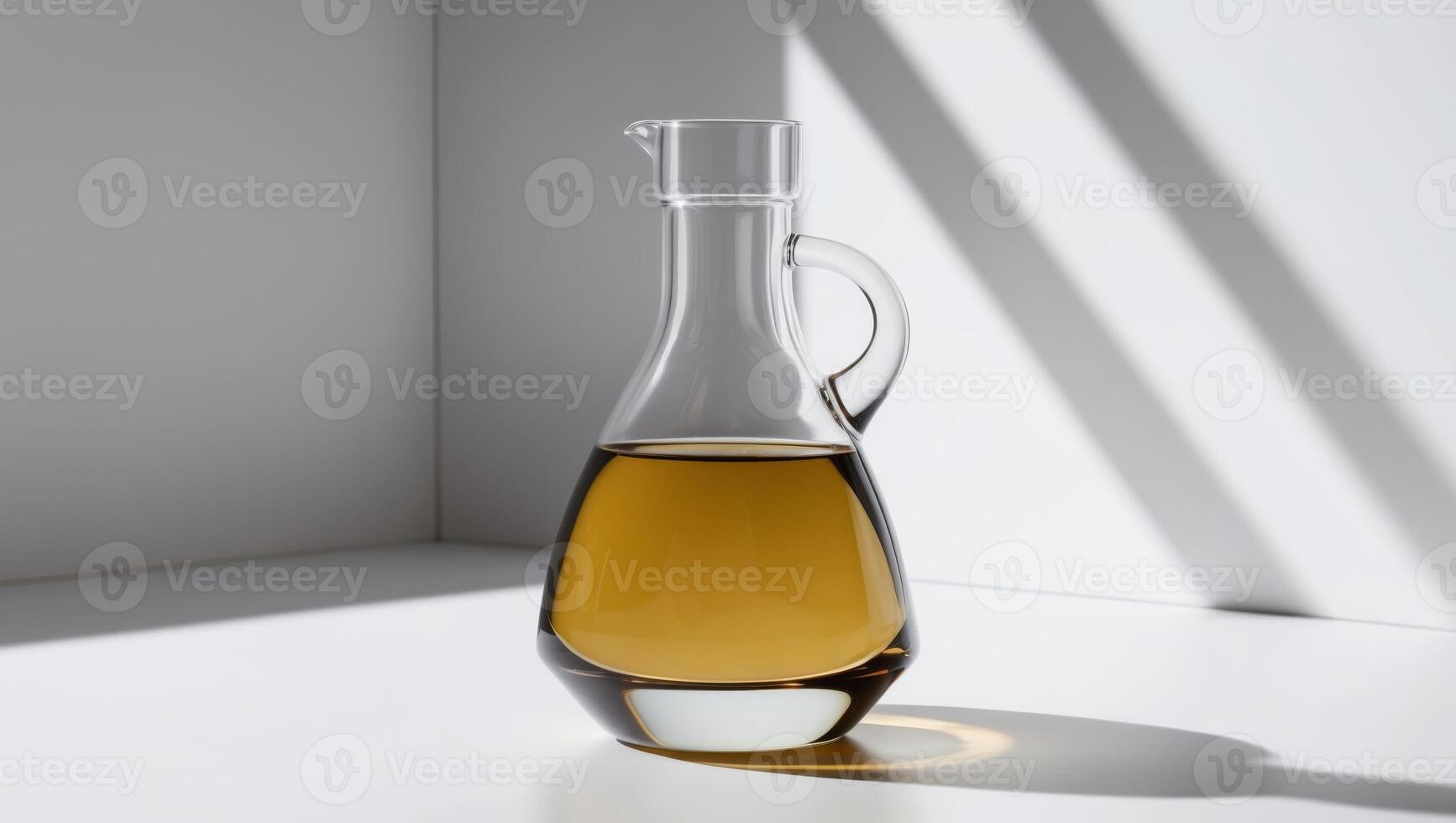 organic cold pressed poppy seed oil in a glass carafe. photo