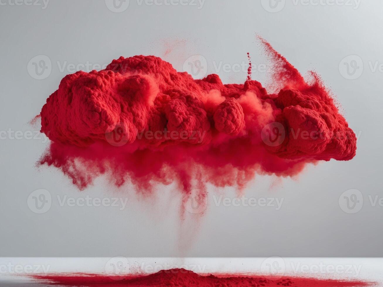 Vibrant red powder cloud captured in stillness. photo