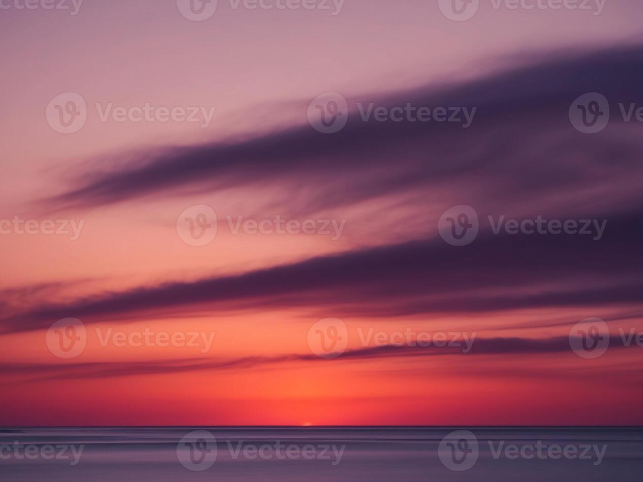 Vivid Sunset with Deep Orange and Purple Hues. photo