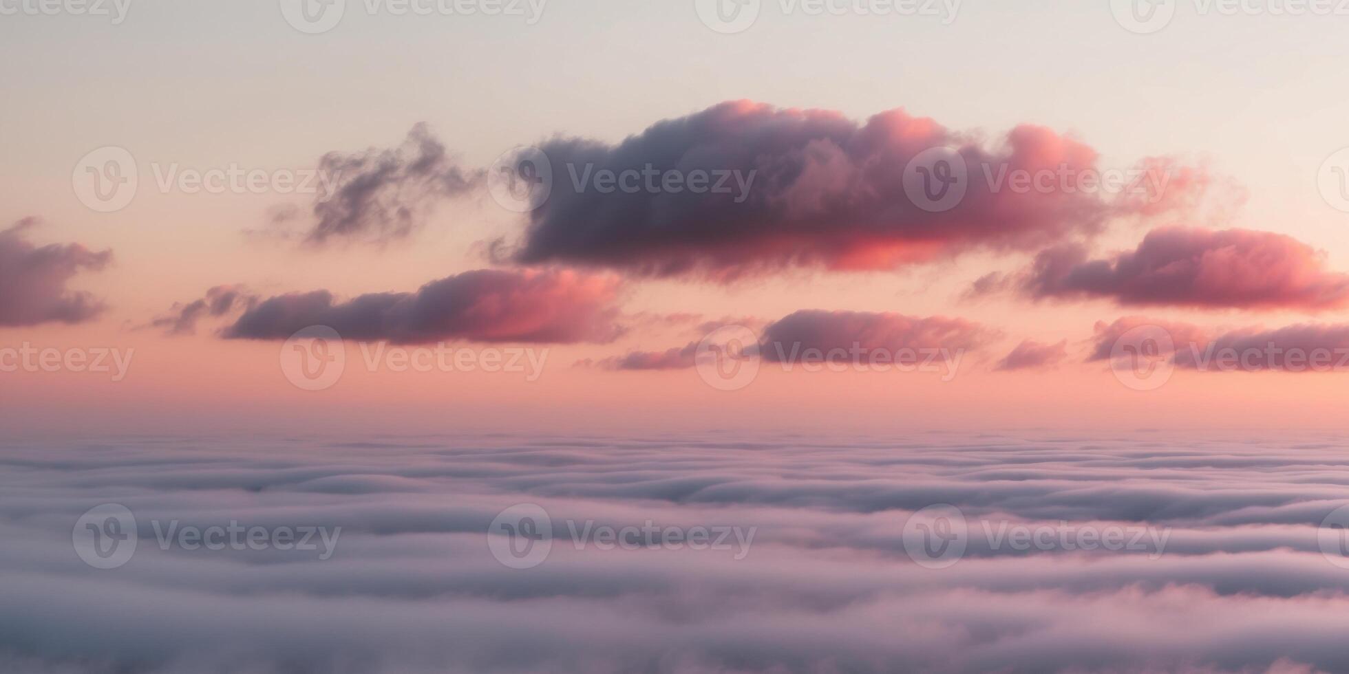 Colorful sunset clouds over a sea of fog. photo