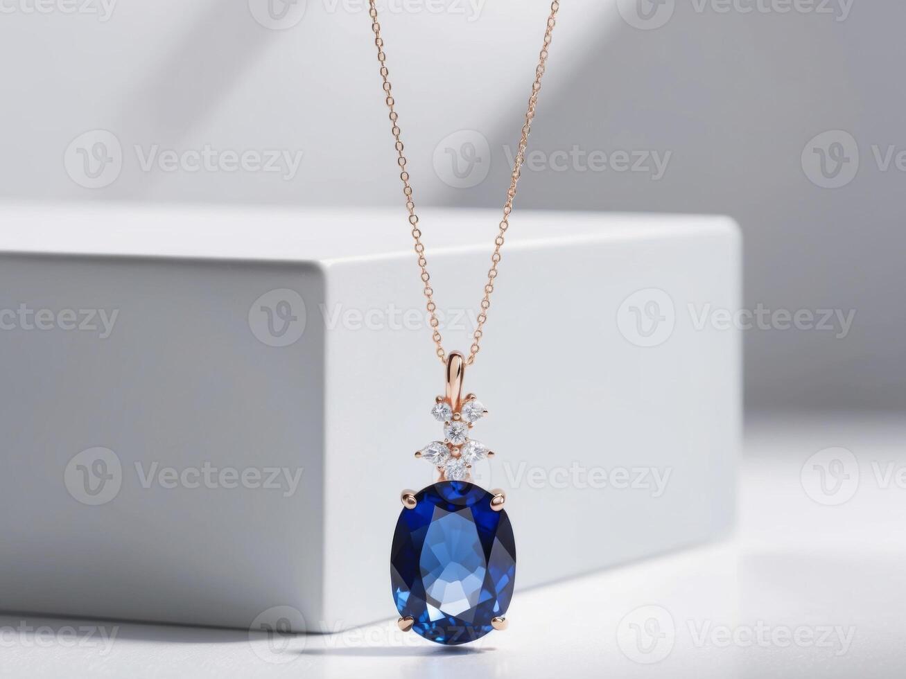 Elegant blue gemstone pendant with diamond accents. photo