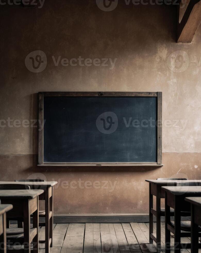 Empty chalkboard in a rustic classroom setting. photo