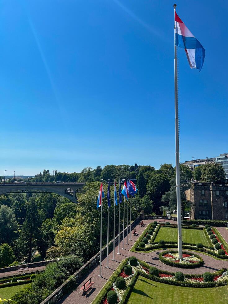 Flag of Luxembourg, flag flutters in the wind. Luxembourg City Europe photo