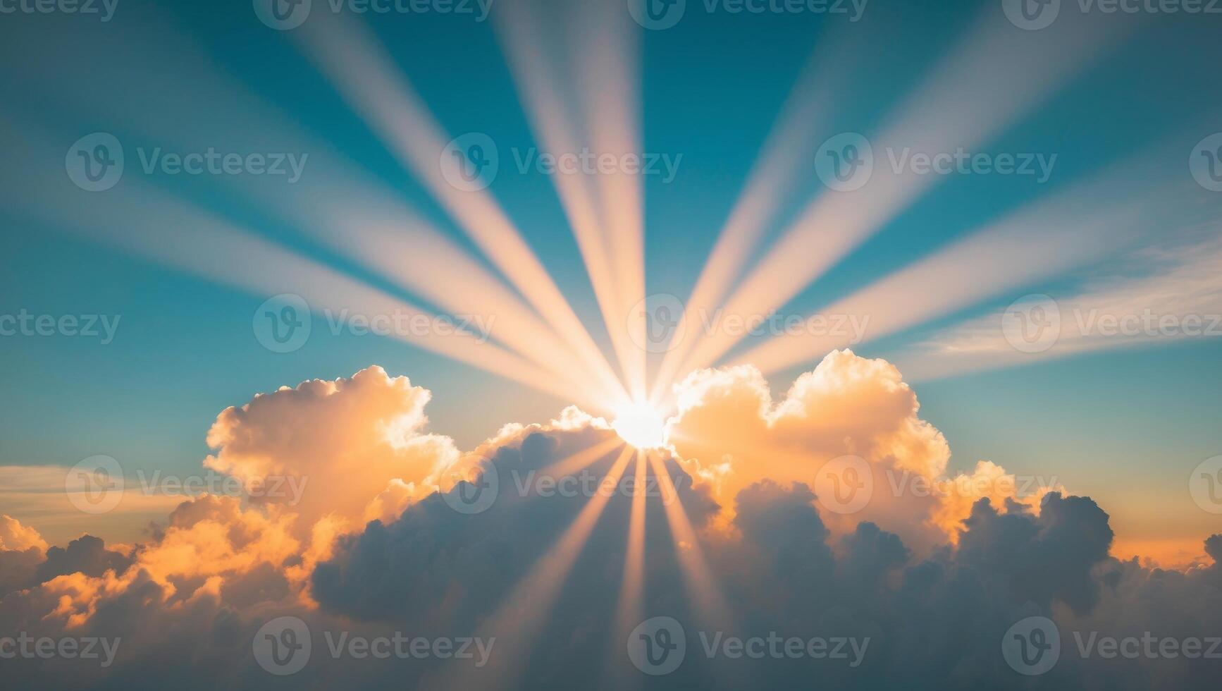 Sunbeams shining through clouds in the sky photo