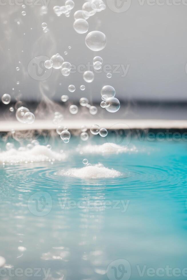 Bubbles in a pool with water splashing photo