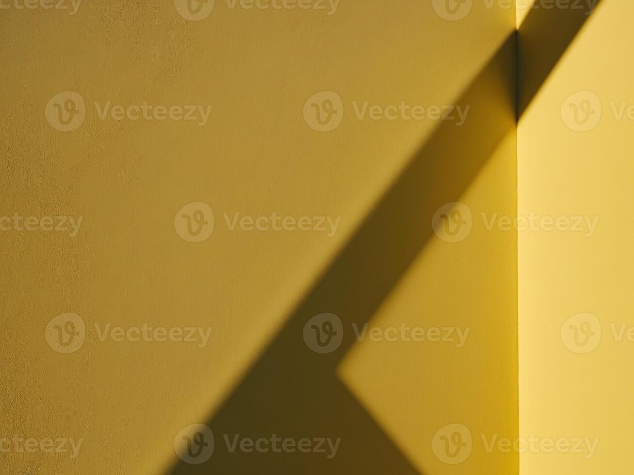 A yellow wall with a shadow of a person photo