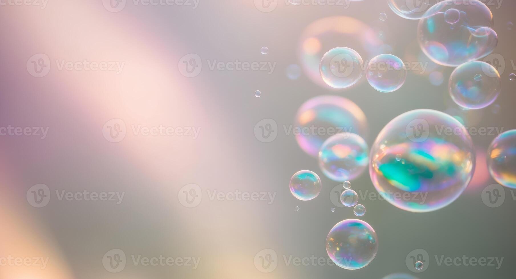 Soap bubbles floating in the air on a gray background photo