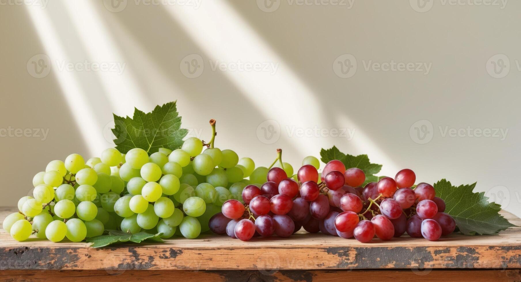 Grapes on a wooden table with sunlight photo