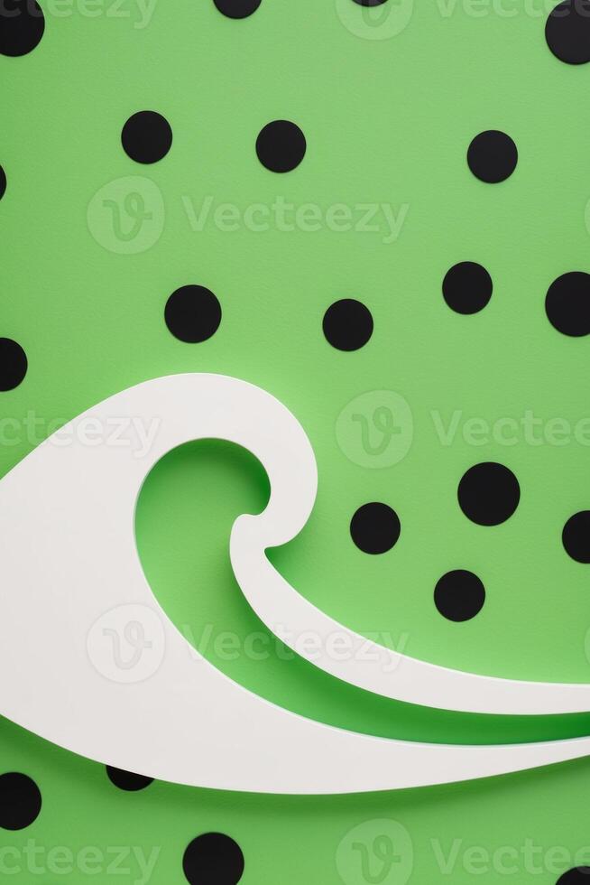 A green and black polka dot background with a white surfboard photo