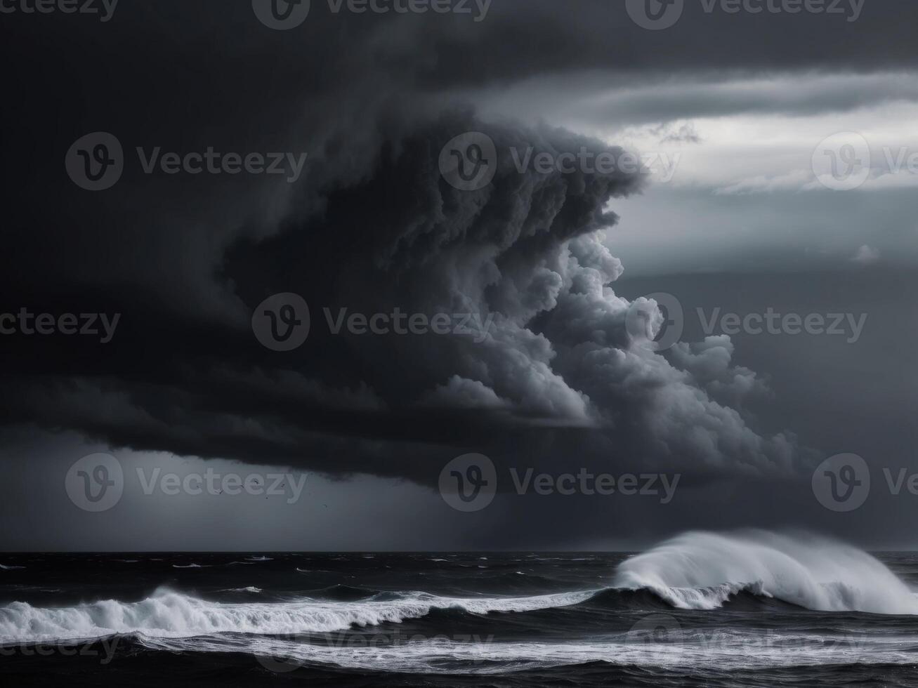 A black and white photo of a stormy sky over the ocean