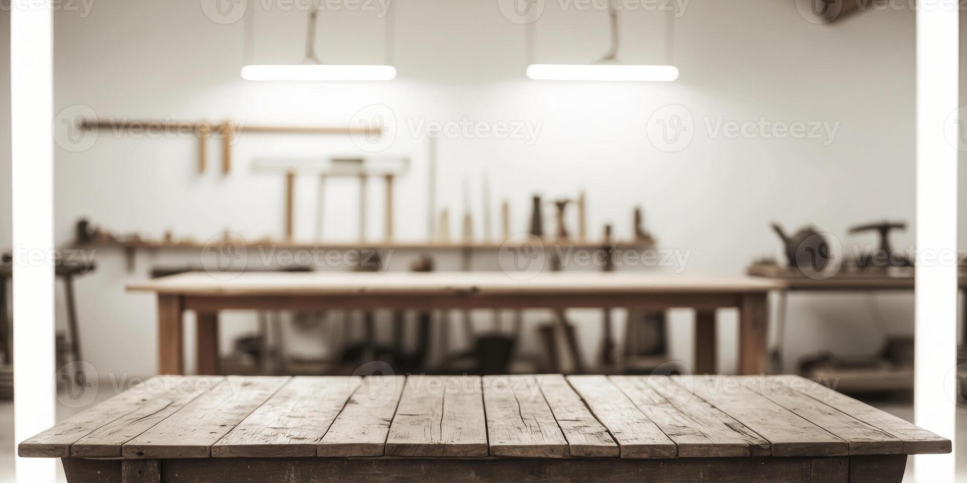 A wooden table in a workshop with tools on it photo