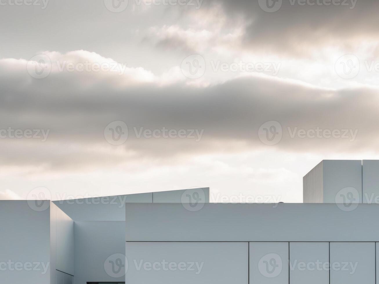 A building with white walls and a sky photo