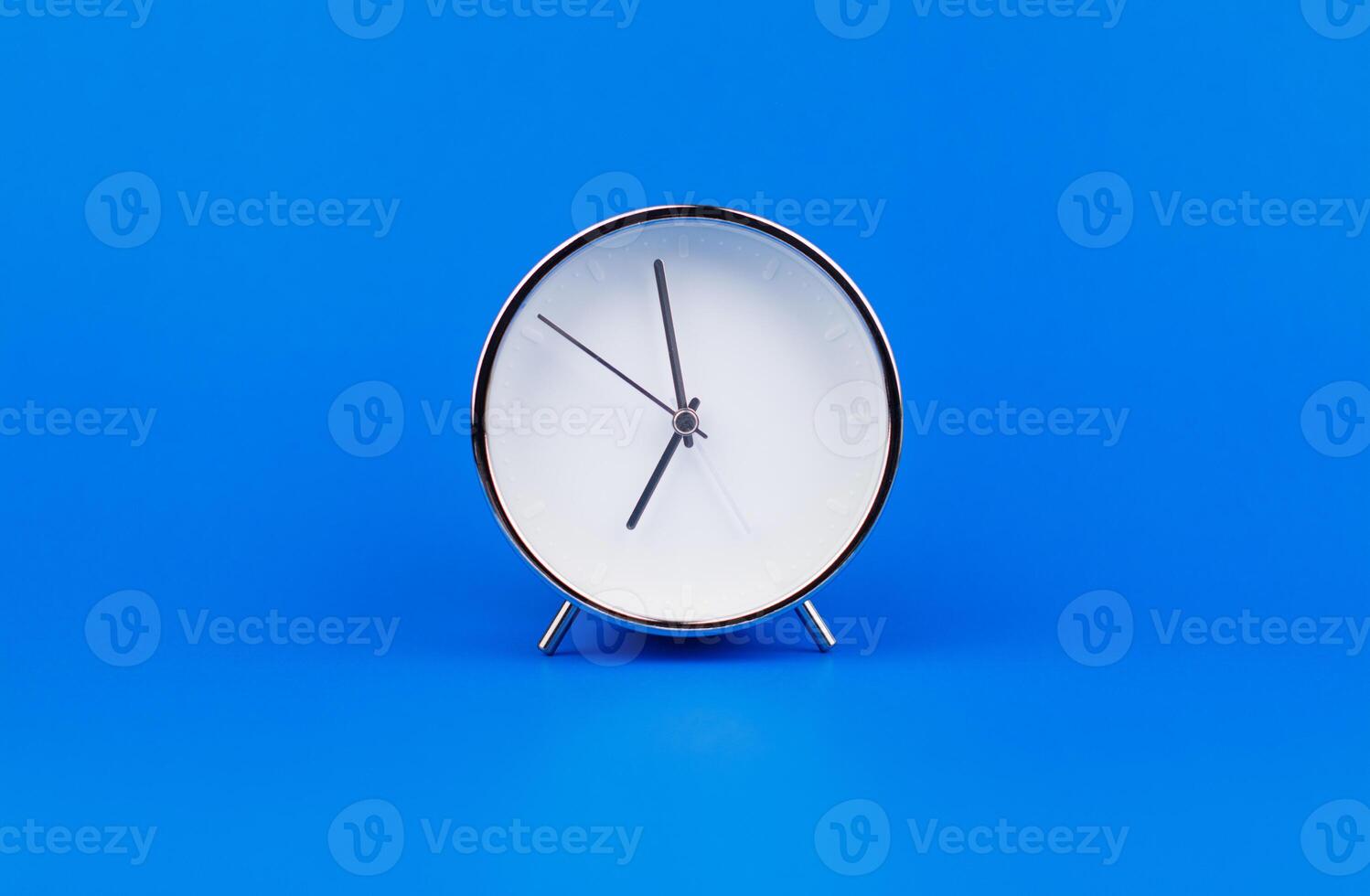 Clocks telling time and everyday tasks High quality studio photography photo