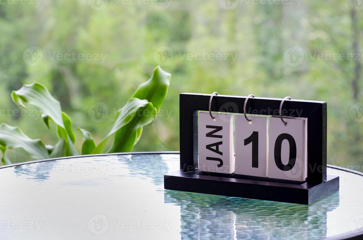 10 January calendar table with blurred nature background. With customizable space for text or ideas photo