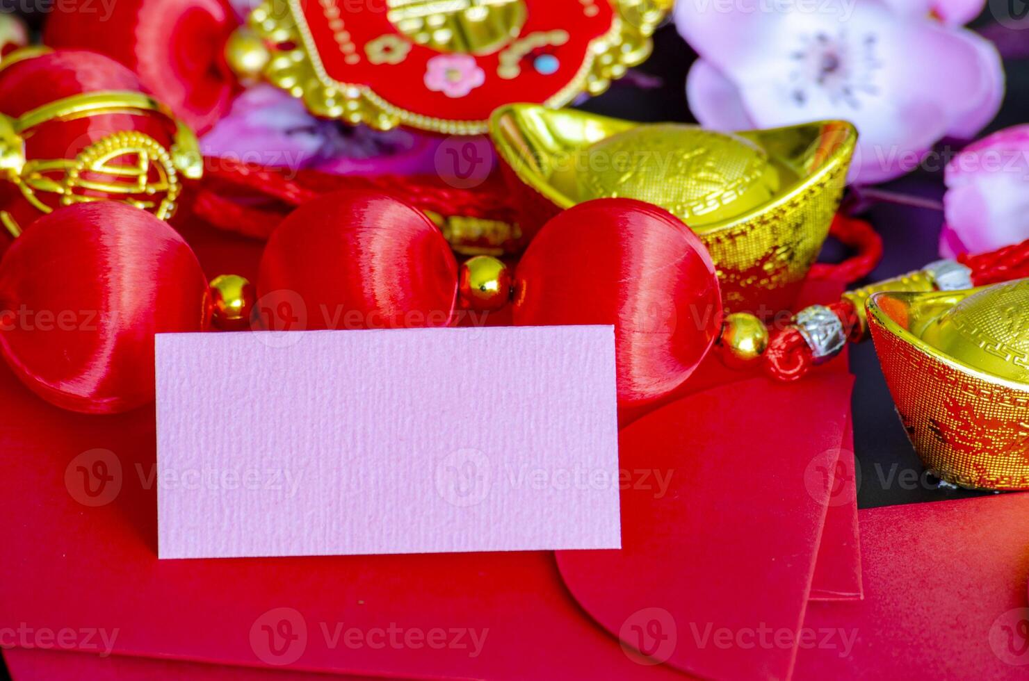 Chinese New Year decoration with customizable space on notepad for text or wishes. Chinese New Year celebration concept photo