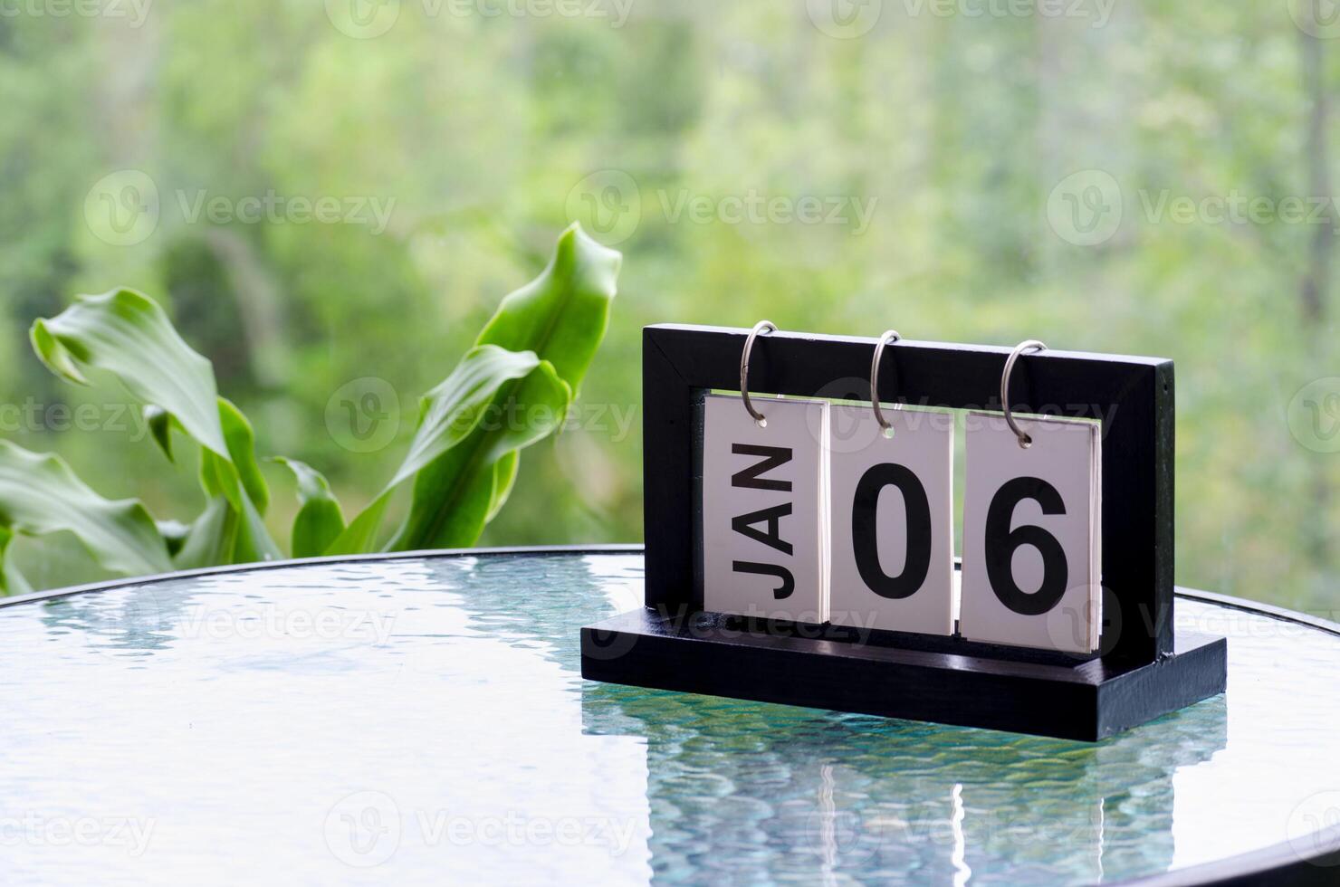 6 January calendar table with blurred nature background. With customizable space for text or ideas photo