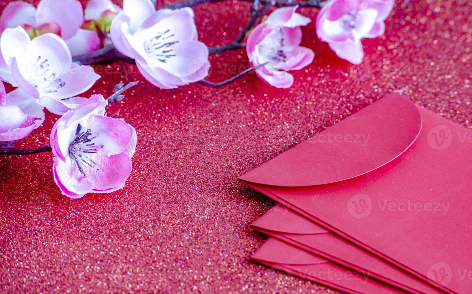 Red packets with customizable space for Chinese New Year wishes photo