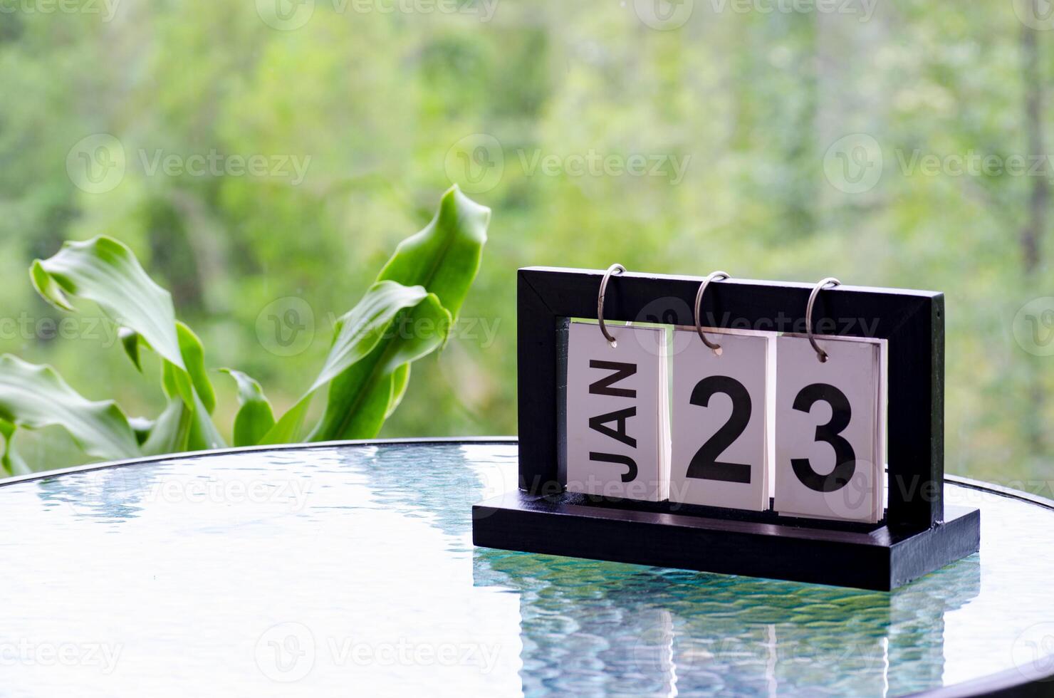 23 January calendar table with blurred nature background. With customizable space for text or ideas photo