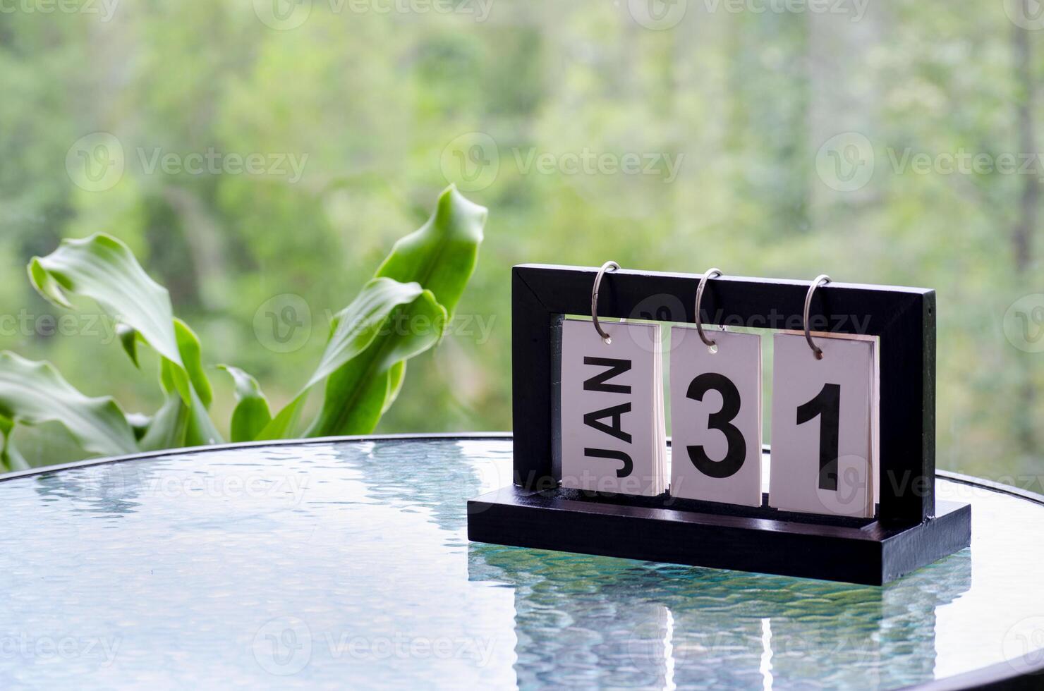 31 January calendar table with blurred nature background. With customizable space for text or ideas photo