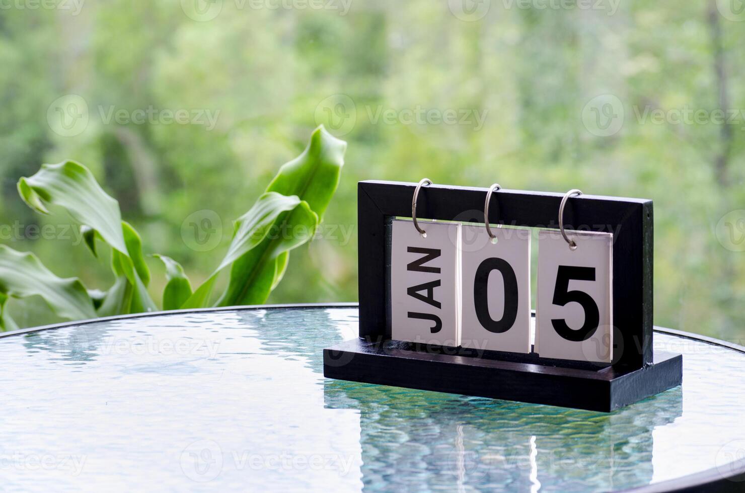 5 January calendar table with blurred nature background. With customizable space for text or ideas photo