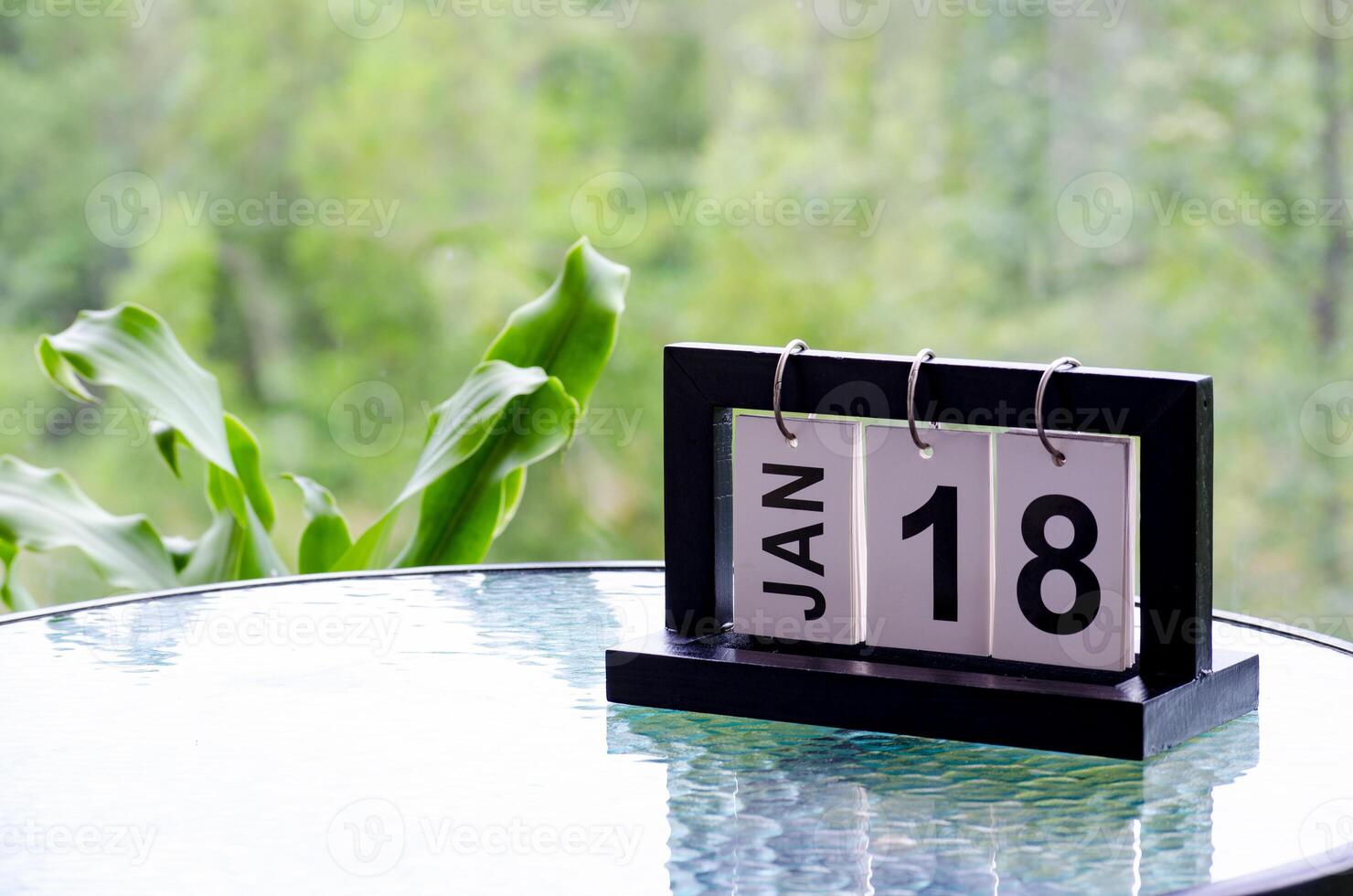 18 January calendar table with blurred nature background. With customizable space for text or ideas photo