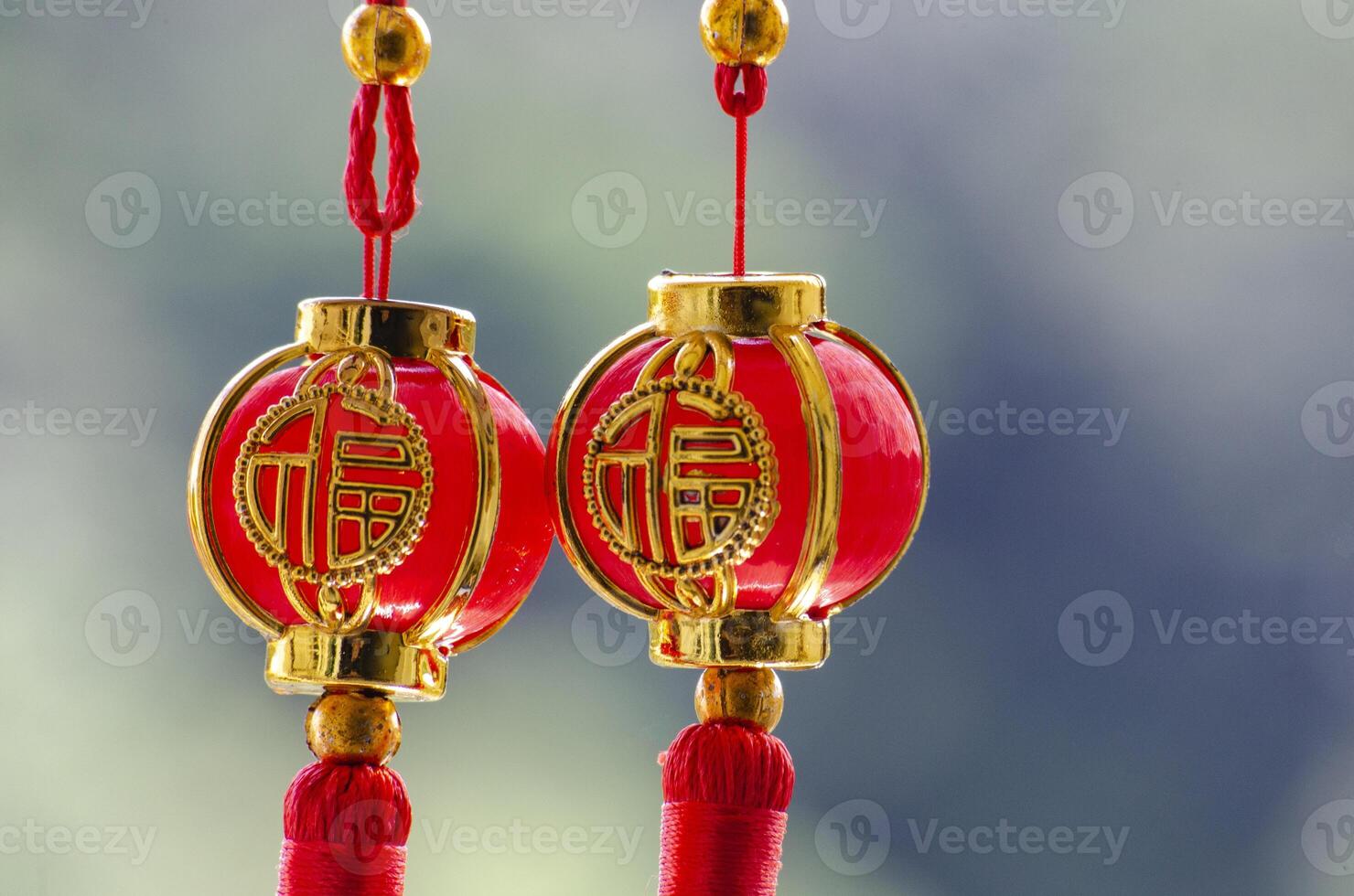 Close up view of two Chinese New Year hanging balls. Chinese New Year celebration concept photo