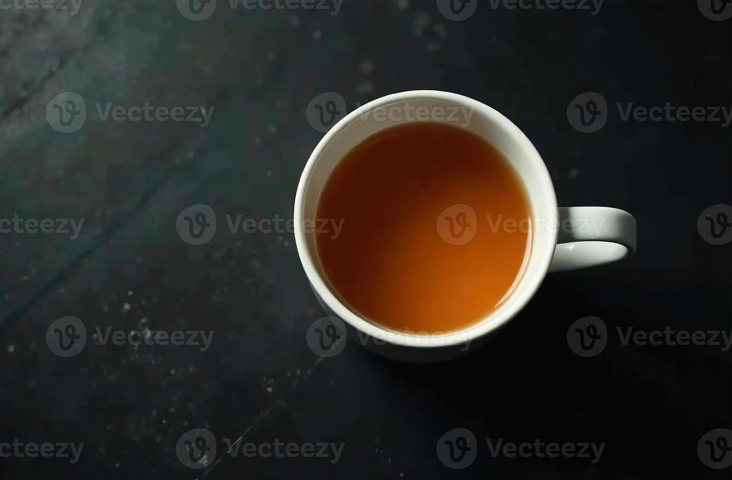 Glass mug warm tea on dark background, drink for restaurant menu photo