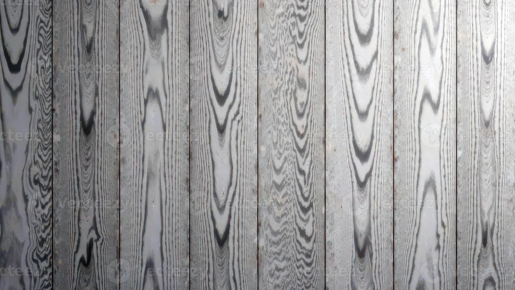 Gray wooden texture with vertical planks and unique grain pattern photo