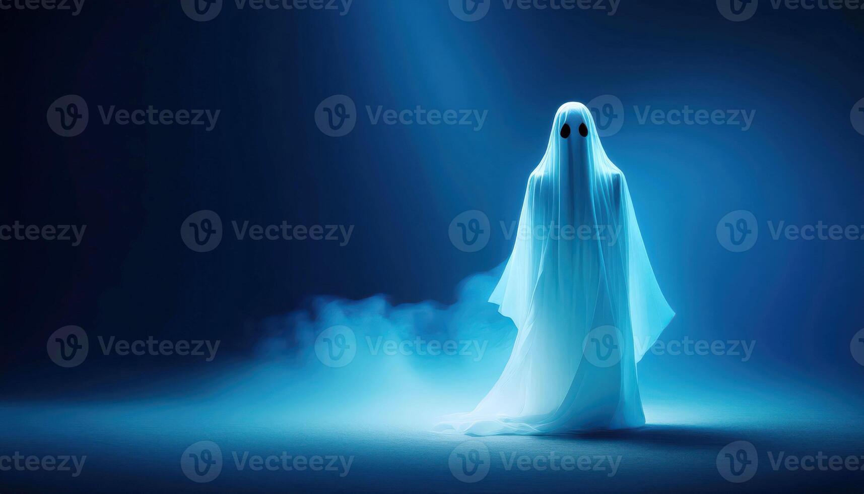 Ethereal ghostly figure in blue misty light with glowing eyes photo
