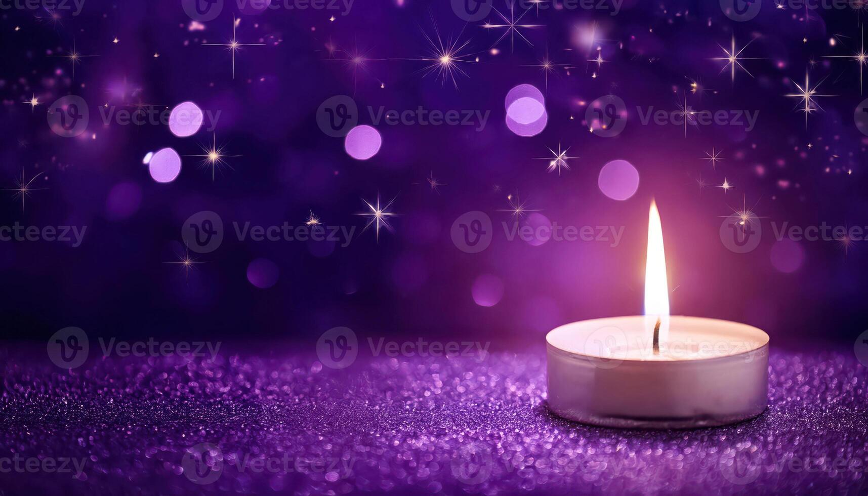 Glowing candle on sparkling purple background with soft bokeh and stars photo