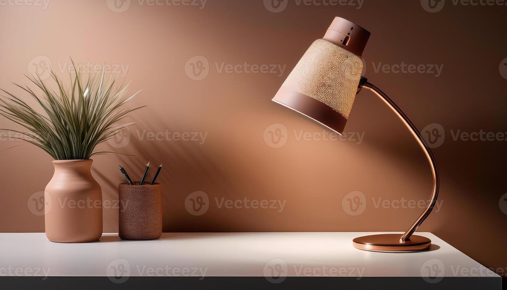 Modern desk lamp with plant on stylish workspace in warm tones photo