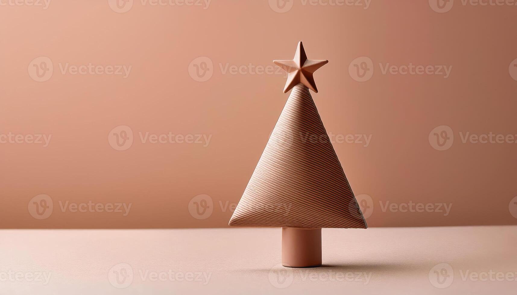 Minimalist clay christmas tree with star on beige background photo