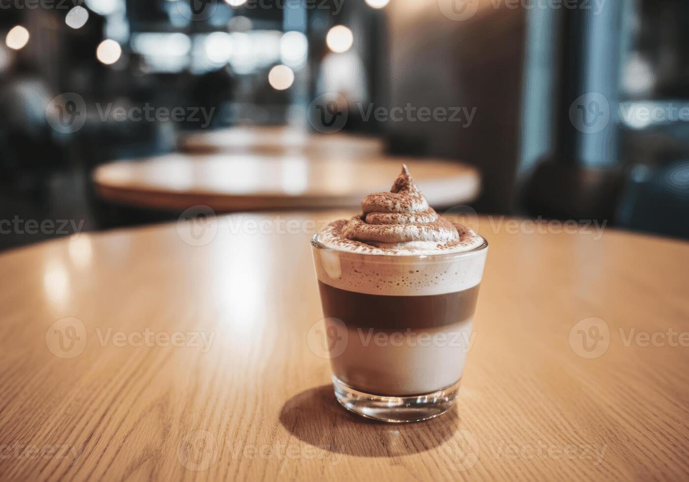 Cappuccino with whipped cream on wooden table in cozy cafe ambiance photo
