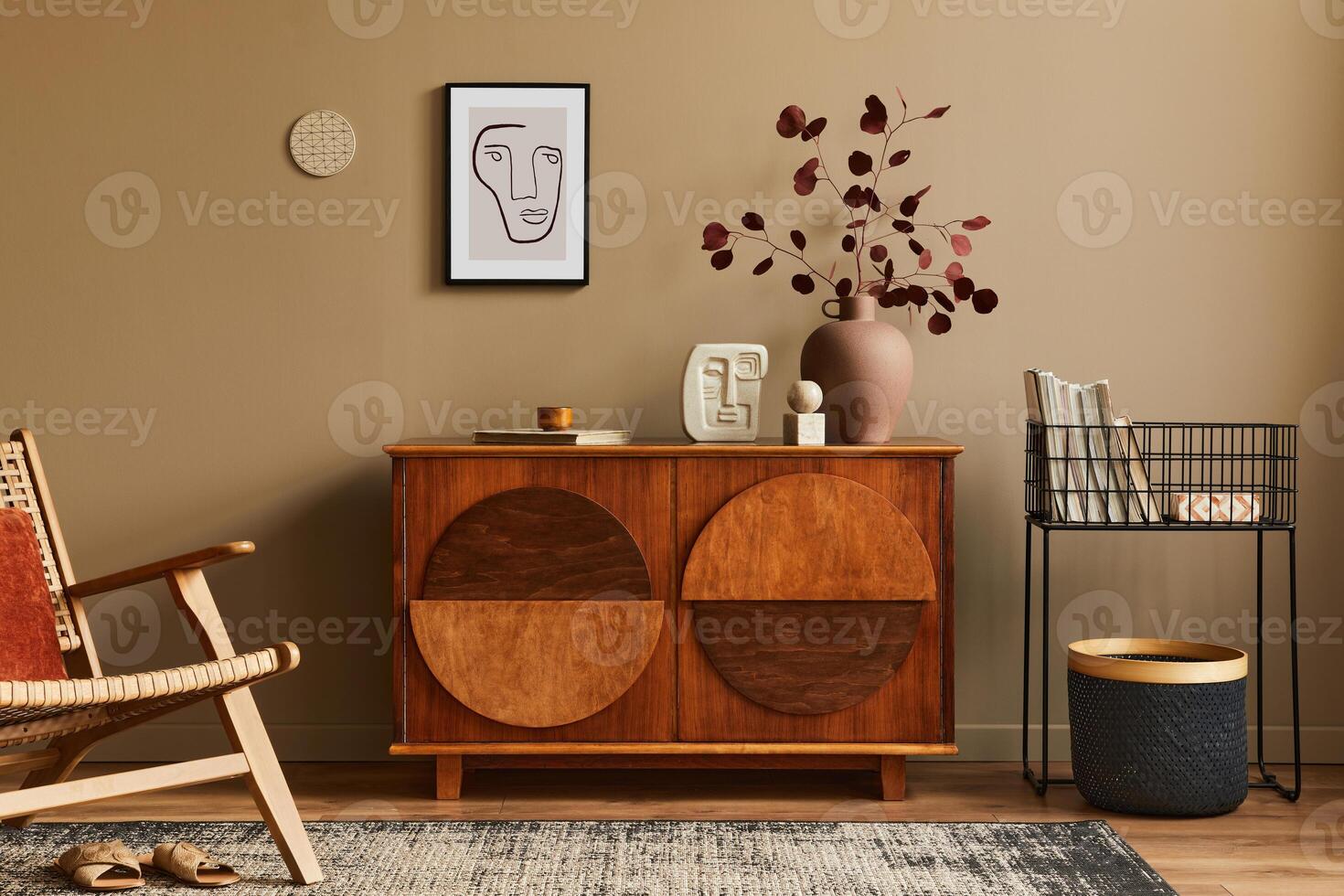 Interior design of unique living room with stylish commode, armchair, dired flowers in vase, mock up poster on the wall, carpet, decoration and personal accessories in modern home decor. Template. photo