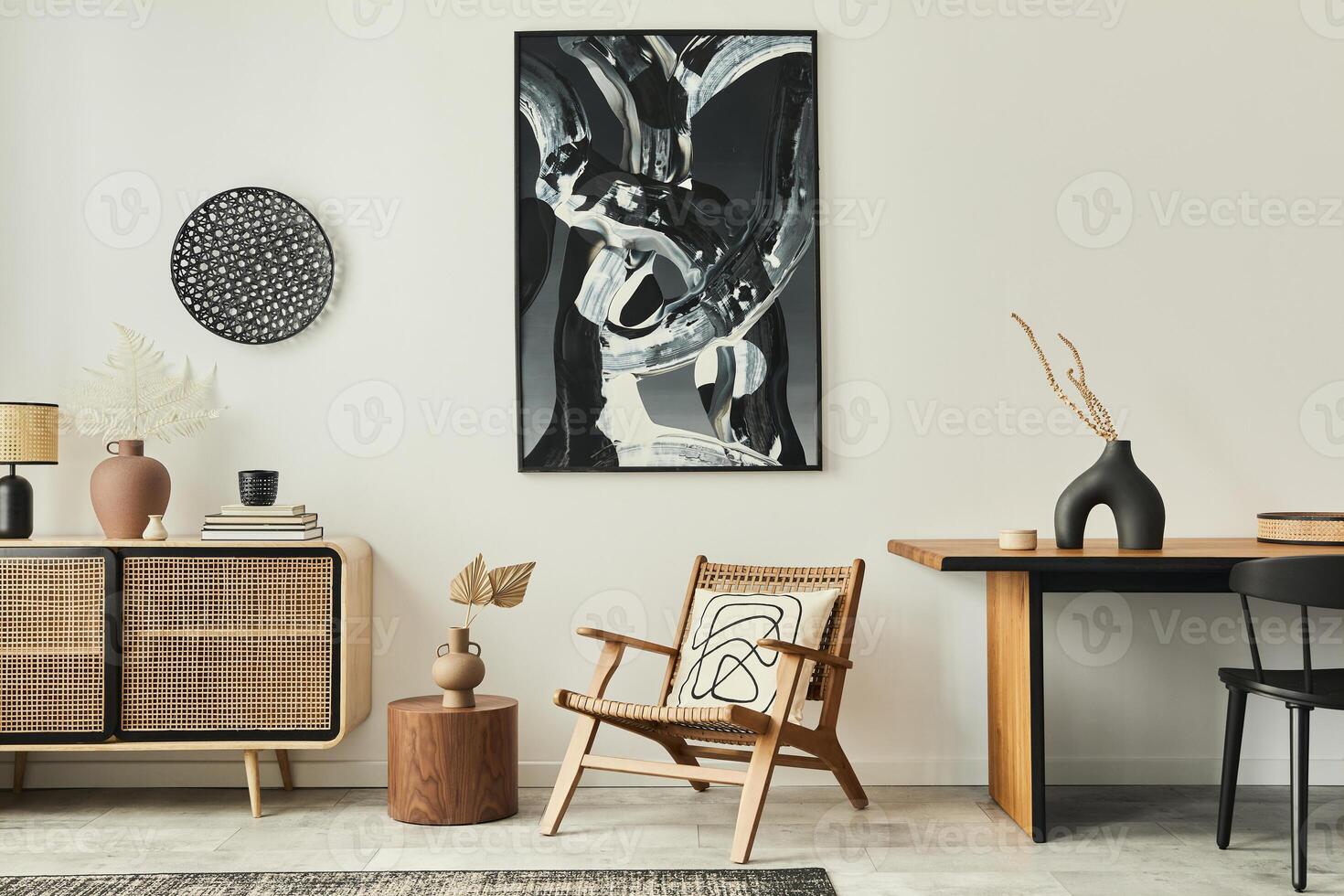 Stylish scandinavian living room interior of modern apartment with wooden commode, design table, chairs, carpet, abstract paintings on the wall and personal accessories in unique home decor. Template. photo