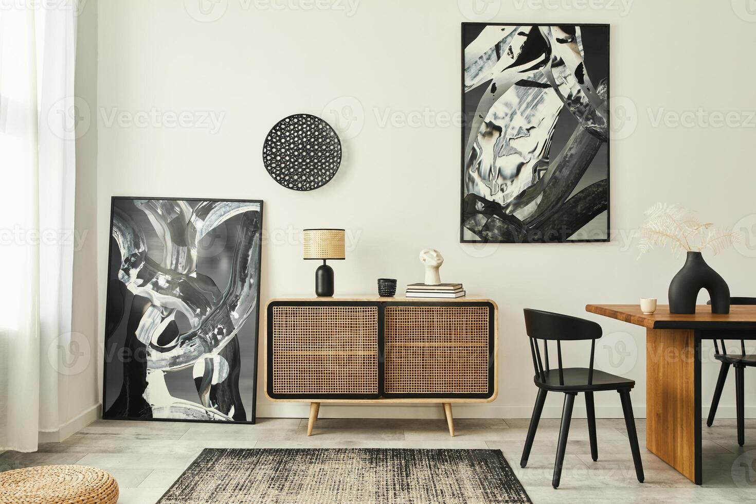 Stylish scandinavian living room interior of modern apartment with wooden commode, design table, chairs, carpet, abstract paintings on the wall and personal accessories in unique home decor. Template. photo