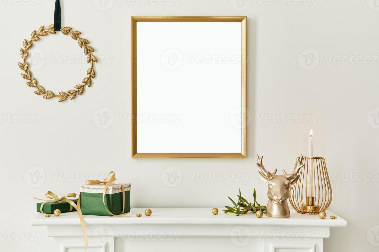 Christmas composition with gold mock up poster frame, white chimney and decoration. Christmas trees and wreath, candles, stars, light and elegant accessories. Template. photo