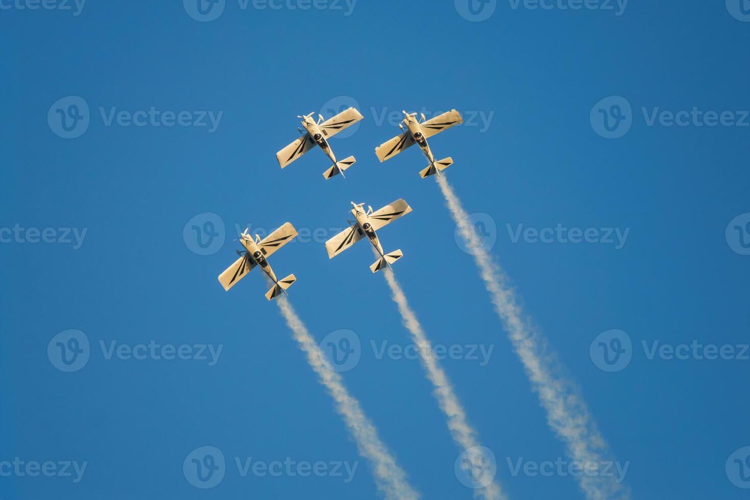 Stunt aerobatic planes performing stunts in air photo