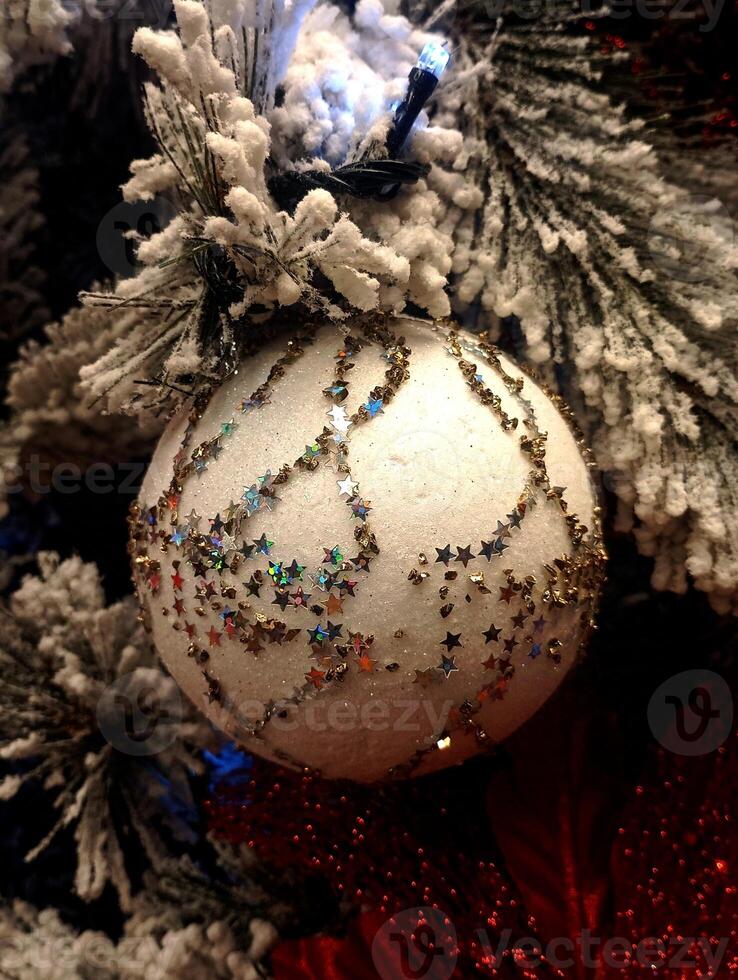 abstract twinkling christmas ornament decorated tree wallpaper background in white sparkle glitter colored photo