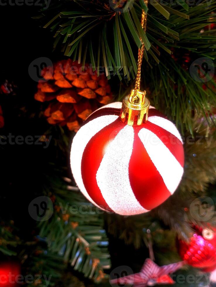 abstract twinkling christmas ornament decorated tree wallpaper background in red sparkle glitter colored photo