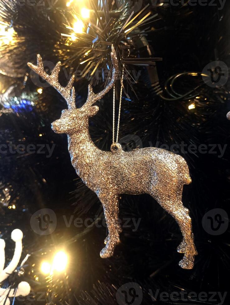 abstract christmas deer ornament decorated tree wallpaper background in white colored photo