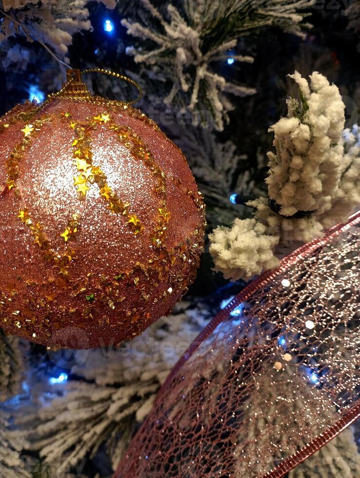 abstract twinkling christmas ornament decorated tree wallpaper background in red sparkle glitter colored photo