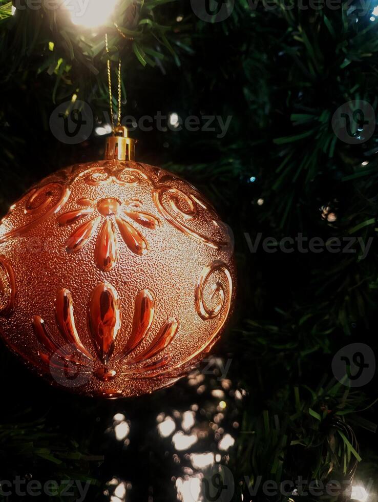 abstract twinkling christmas ornament decorated tree wallpaper background in red sparkle glitter colored photo