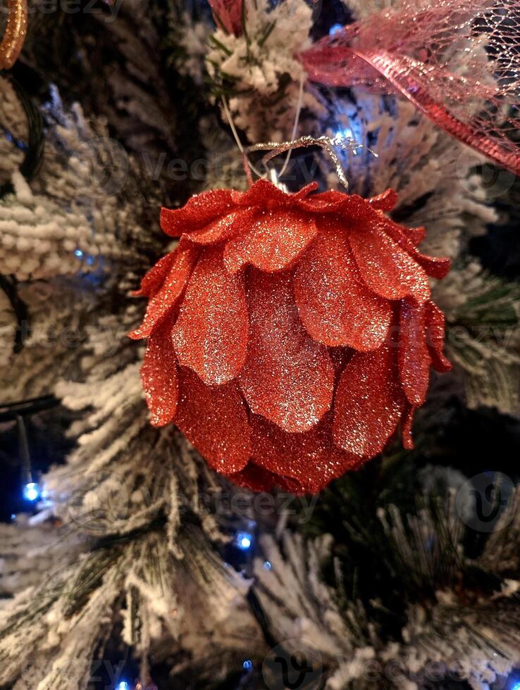 abstract twinkling christmas ornament decorated tree wallpaper background in red sparkle glitter colored photo