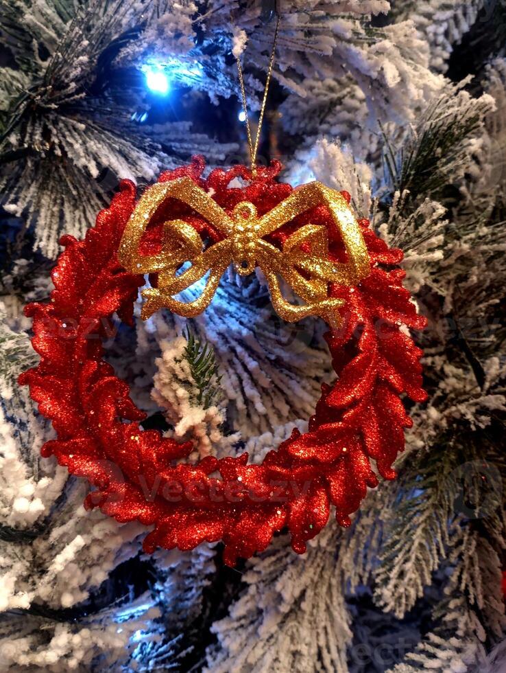 abstract twinkling christmas mistletoe ornament decorated tree wallpaper background in red sparkle glitter colored photo