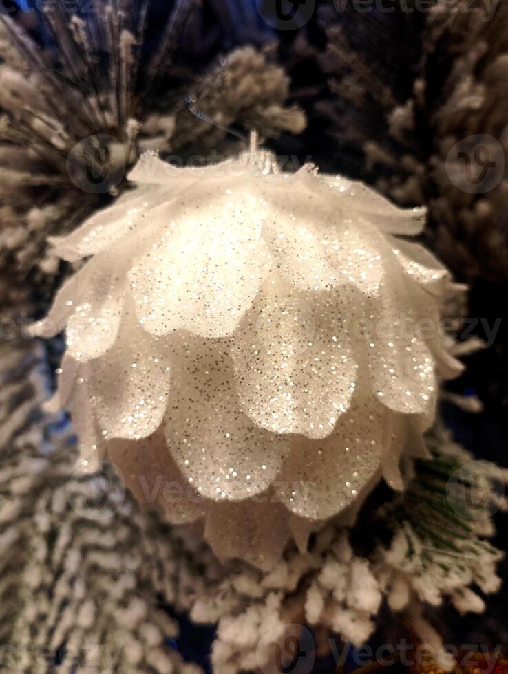 abstract twinkling christmas ornament decorated tree wallpaper background in white sparkle glitter colored photo