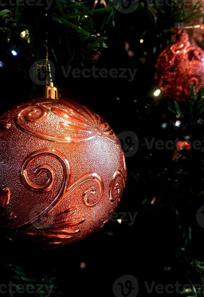 abstract twinkling christmas ornament decorated tree wallpaper background in red sparkle glitter colored photo
