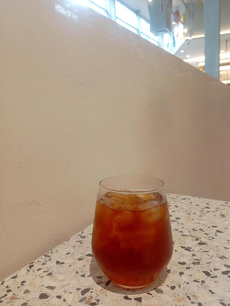 A photo of iced tea, either sweetened or unsweetened, commonly found at cafes or restaurants.